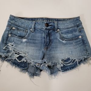 American Eagle Size 4 Super Stretch Shortie Distressed Jean Shorts